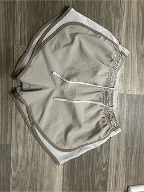 Nike Beige Athletic Shorts with White Accents